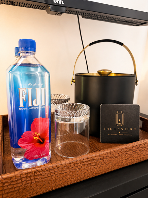 Artisanal water bottle with flower display