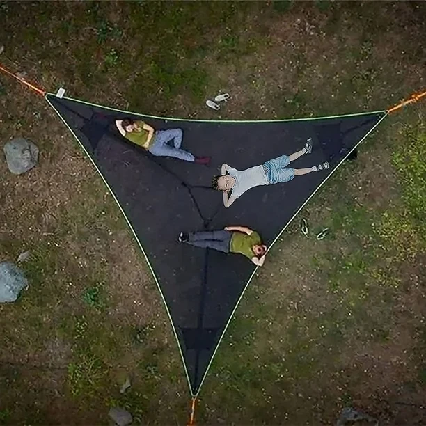 Three people relaxing in hammock aerial view